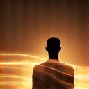 Person in a peaceful pose, surrounded by gentle light, representing mindfulness and presence.